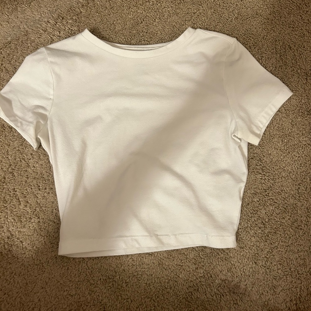 Four never worn colorful cropped t-shirts